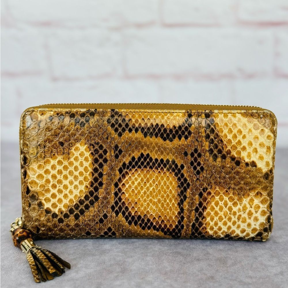 Gucci Python Embossed Tassel Zippy Wallet - image 1